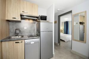 Appart'hotels Residence Odalys Aqualia : photos des chambres