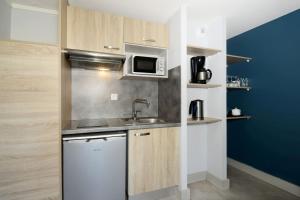 Appart'hotels Residence Odalys Aqualia : photos des chambres