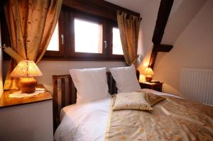 Hotels La Cour du Bailli Suites & Spa : photos des chambres