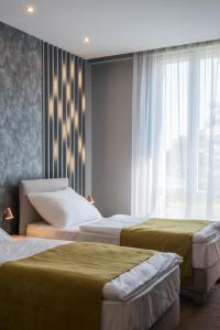 Two-Bedroom Suite room in Várda Sport Hotel