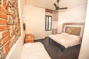 Hotels Kalliste : Chambre Triple (1 Lit Double et 1 Lit Simple)