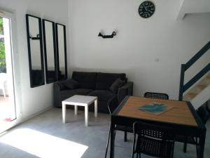 Appartements Petit Loft T2 bis mezzanine avec jardin et piscine : photos des chambres