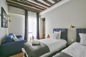 Appartements 70 - Authentic Parisian Flat : photos des chambres