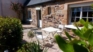 Maisons de vacances Ty Jeanne, le charme de la pierre au coeur du village : photos des chambres