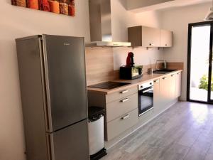 Appartements Appartement 80m2 dans Villa : photos des chambres