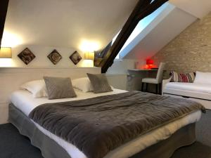 Hotels Le Pigeonnier du Perron Hotel : photos des chambres