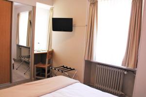 Hotels Hostellerie au Cygne : photos des chambres