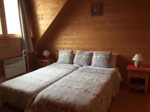 Maisons de vacances Ferme Noemie (Bourg d'Oisans) : photos des chambres