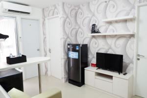 Exquisite 2BR Bassura City Apartment near Shopping Mall By Travelio
