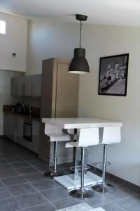 Appartements Le Voltaire : photos des chambres