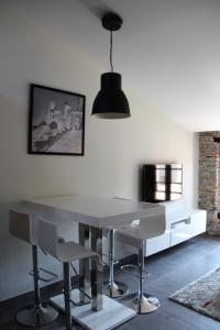 Appartements Le Voltaire : photos des chambres