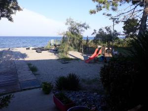 Appartements les pieds dans l'eau les Marines de Moriani 4 couchages : photos des chambres