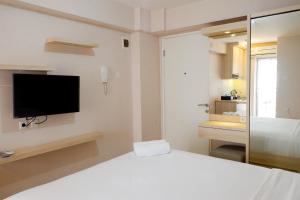 Cozy Studio at Bassura Apartment near to Bassura Mall By Travelio