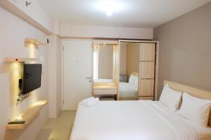 Cozy Studio at Bassura Apartment near to Bassura Mall By Travelio