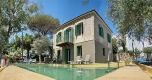 Ouzo Traditional House with private pool - بلوماري