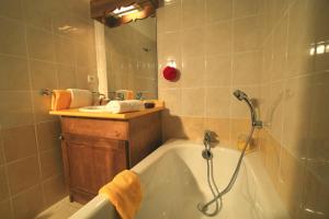 Appartements travelski home select - Residence L'Arollaie 4 stars : photos des chambres