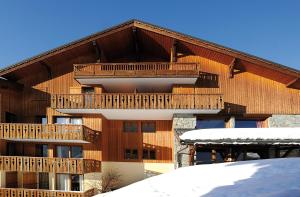 Appartements travelski home select - Residence L'Arollaie 4 stars : photos des chambres