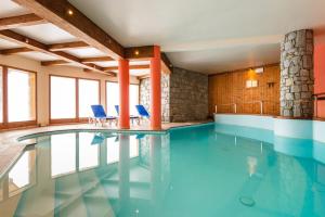 Appartements travelski home select - Residence L'Arollaie 4 stars : photos des chambres