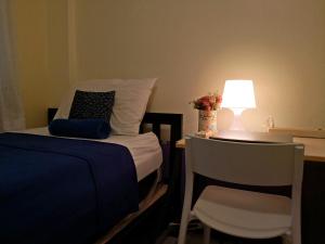 Phòng Đơn với Phòng tắm Riêng Bên Ngoài (Single Room with Private External Bathroom)