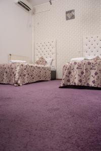 Three-Bedroom Suite room in Iris Boutique