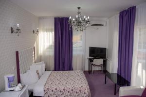 King Room with Balcony room in Iris Boutique