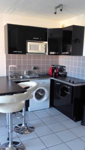 Appartements les pieds dans l'eau les Marines de Moriani 4 couchages : photos des chambres