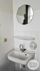 Quadruple Room with Shared Bathroom room in Rembrandt Square Hotel