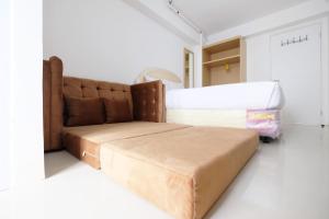 Affordable Studio with Sofa Bed at Bassura City Apartment By Travelio