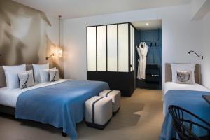 Hotels Hotel Les Deux Girafes : photos des chambres
