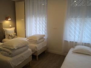 Appartements Sohosuite : photos des chambres