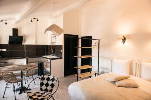 Maisons d'hotes Les suites du 17 : photos des chambres