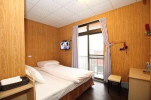 Zhongshan Hostel - Ubytování bez kategorie ve městě Fenchihu
