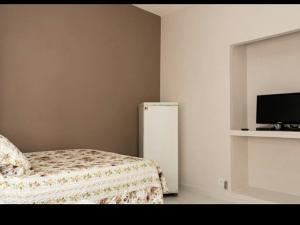 pequeno e aconchegante meia quadra da praia