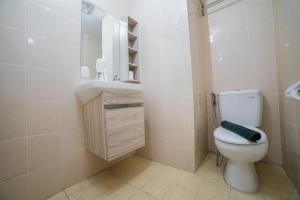 Modern 1BR Apartment Near Cihampelas at Parahyangan Residence By Travelio