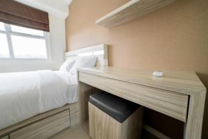 Modern 1BR Apartment Near Cihampelas at Parahyangan Residence By Travelio