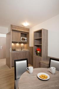 Appart'hotels Sejours & Affaires Reims Clairmarais : photos des chambres