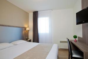 Appart'hotels Sejours & Affaires Reims Clairmarais : photos des chambres