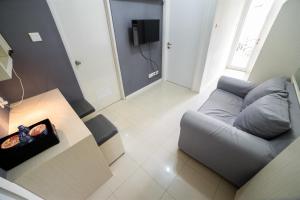 Contemporary 1BR Near Cihampelas at Parahyangan Residence Apartment By Travelio