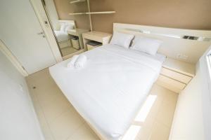 Contemporary 1BR Near Cihampelas at Parahyangan Residence Apartment By Travelio