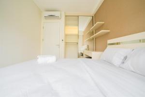 Contemporary 1BR Near Cihampelas at Parahyangan Residence Apartment By Travelio