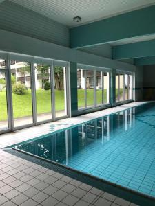 Grubhof Scholsspark, Studio Lofer mit Garten und Schwimmbad