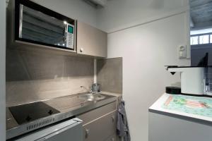 Appartements Studio typique et cosy climatise. : photos des chambres