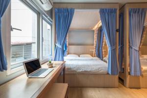 1 giường đôi trong phòng tập thể 4 giường đôi - Nam & Nữ (1 Double Bed in 4-Double Bed Dormitory - Mixed)