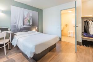 Hotels B&B HOTEL Orgeval : photos des chambres