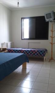 Apartamento Guilhermina - Ed Frente ao Mar