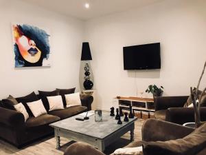 Appartements Les Chambres du Palais : photos des chambres