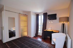 Hotels Logis Aux Maisons : photos des chambres