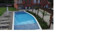 Pé na areia em Boiçucanga condominio Aquamarine - perto de Maresias e Camburi