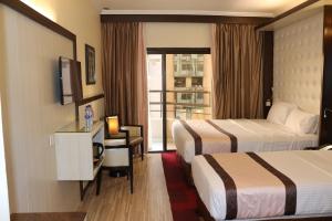  Deluxe family Room Sea view with Balcony room in Al Khaleej Grand Hotel