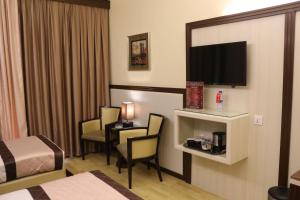 Standard Triple Room with Balcony room in Al Khaleej Grand Hotel